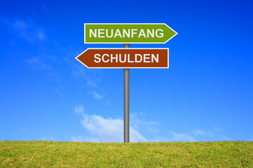 Schild Wegweiser zeigt Schulden Neuanfang