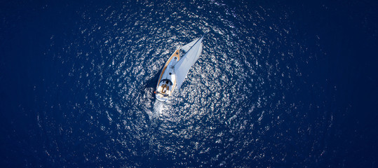 Fototapeta premium Amazing view to Yacht sailing in open sea at windy day. Drone view