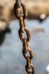 Old corroded metal chain, close up