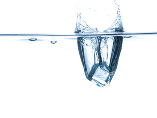 ice cubes splash in water