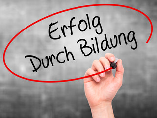 Man Hand writing Erfolg Durch Bildung  (Success Through Training