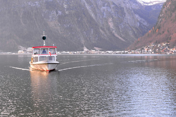 Ferry in Hallstatt Lake with Hallstat village background, Salzka