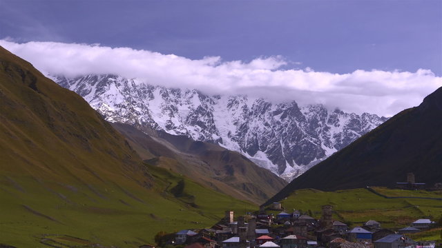 Time lapse clip. Majestic morning mountain landscape at the foot of  Mt. Ushba. Upper Svaneti, Georgia, Europe. Caucasus mountains. Beauty world. 4K video 