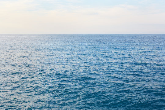 Mediterranean blue, calm sea with horizon in the morning