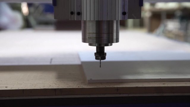 Milling cutting machine makes a plotter cutting in plastic