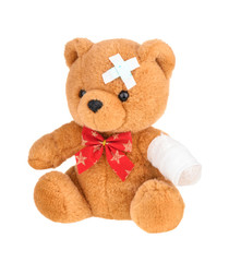 Teddy bear with bandage isolated on white, without shadow.