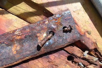 Detail of old rustic nail and wood