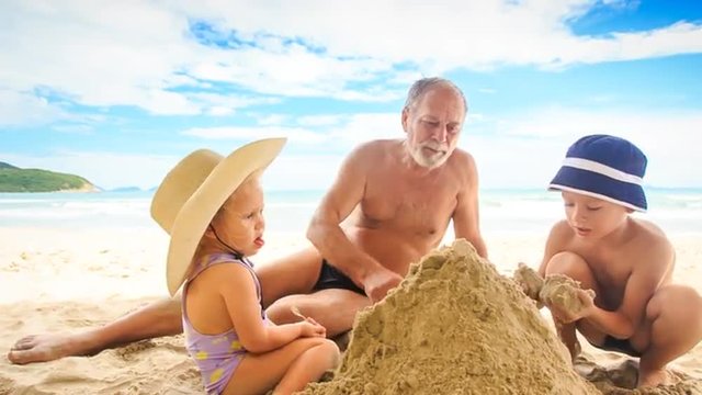 Grandpa Little Girl Boy Sit Spread Sand Heap on Beach by Surf