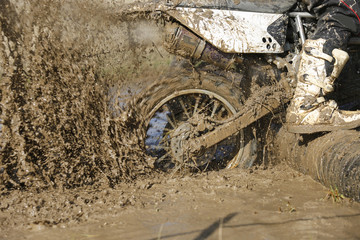 Fototapeta na wymiar Enduro wheel in muddy track
