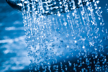 Fototapeta na wymiar Clear water flowing from shower.