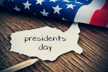 the flag of the US and the text presidents day, vignetted