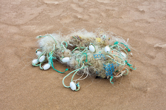 Tangled abandoned marine debris on the Gower peninsula, Swansea