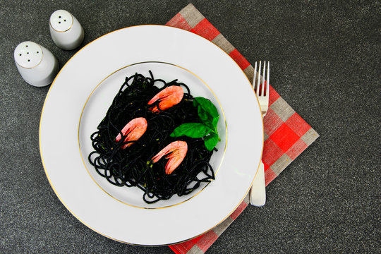 Black Spaghetti with Cuttlefish Ink, Prawns and Basil. Mediterra