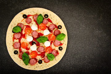 Raw Pepperoni Pizza with Sausage, Cheese, Mozzarella, Olives and