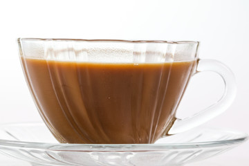 Hot coffee in glass on a white background.