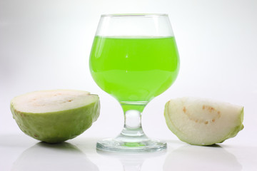 Guava and Guava juice in glass on white background