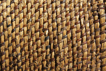 background wicker mat /rustic old background of many small Intertwined straws