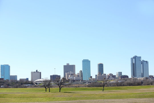 Cityscape view of Fort Worth, Texas skyline from the banks of the Trinity River