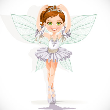Beautiful little fairy girl in white dress and tiara isolated on