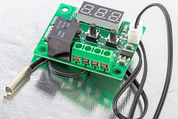 Controller with a temperature sensor