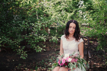 Portrait of a beautiful girl with a bouquet of flowers, lifestyle, concept, love, tenderness