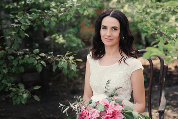 Portrait of a beautiful girl with a bouquet of flowers, lifestyle, concept, love, tenderness