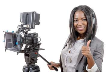 young African American woman with professional video camera and