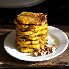 stack of pumpkin fritters on direct sunlight