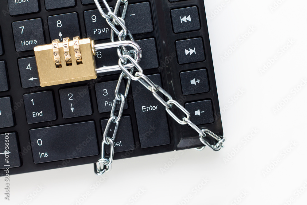Poster locked chain on computer keyboard. concept of security