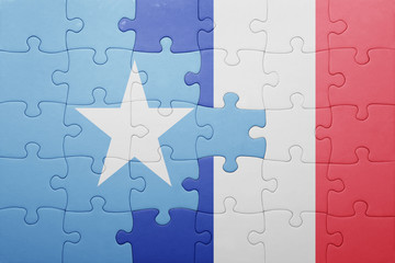 puzzle with the national flag of somalia and france