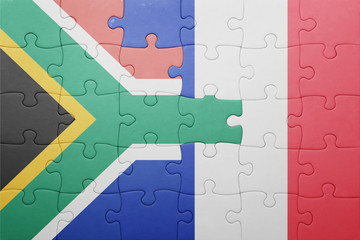 puzzle with the national flag of south africa and france