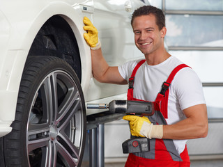 To fit a summer tyre with impact screwdriver
