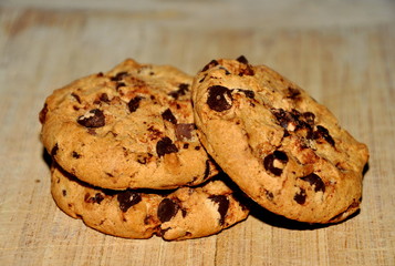 Chocolate cookies on wood background