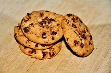 Chocolate cookies on wood background