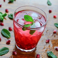 Pomegranate drink with mint and ice