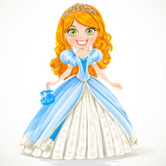 Beautiful red-haired princess in a blue ball dress