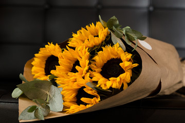 Bouquet of sunflowers on dark background