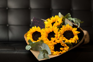 Bouquet of sunflowers on dark background