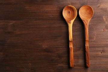 Two wooden spoons on the table, close-up