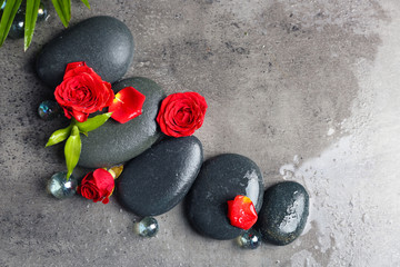 Beautiful spa composition with roses and stones