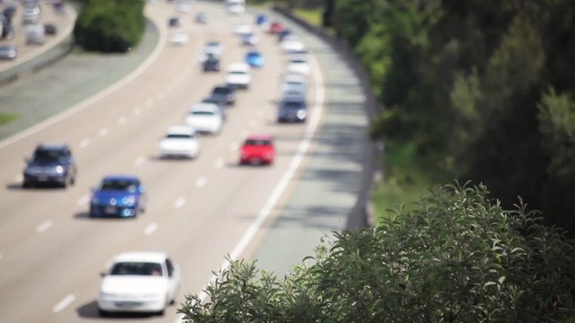 Blurred vehicle traffic on the Pacific Motorway, Australia.