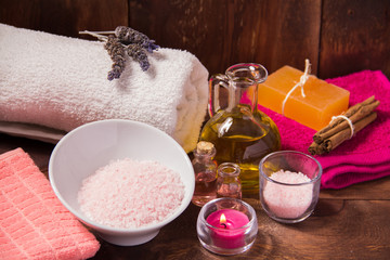 Obraz na płótnie Canvas Massage oil, Bath salts spa and towels