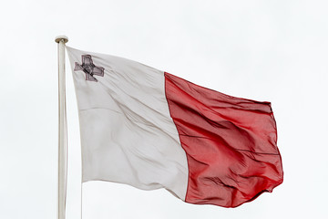 Fototapeta na wymiar Maltese flag waving in the wind