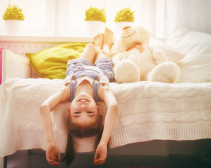girl plays at home