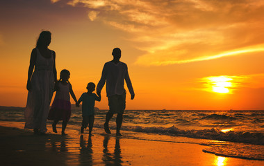 Family walking on the beach happiness Concept