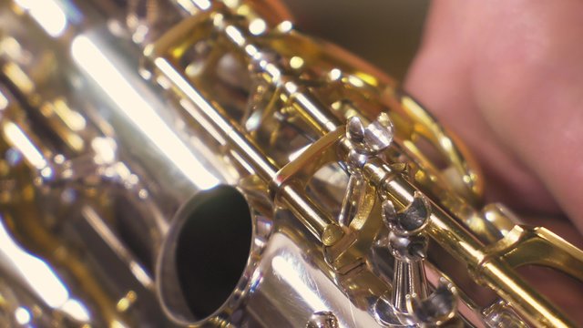 Placing and testing key rod of alto saxophone