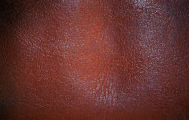 Fototapeta premium Elastic background of soft porous rough brown leather