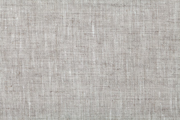Fabric background in neutral grey color, linen texture, top view