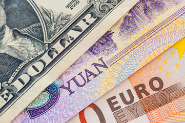 U.S. one dollar bill, five yuan and fifty euro