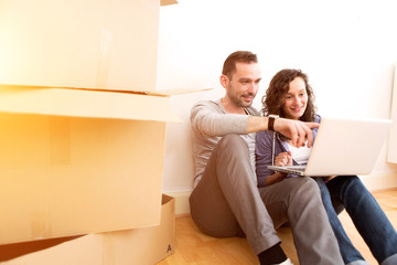 Young couple in love moved in their new flat